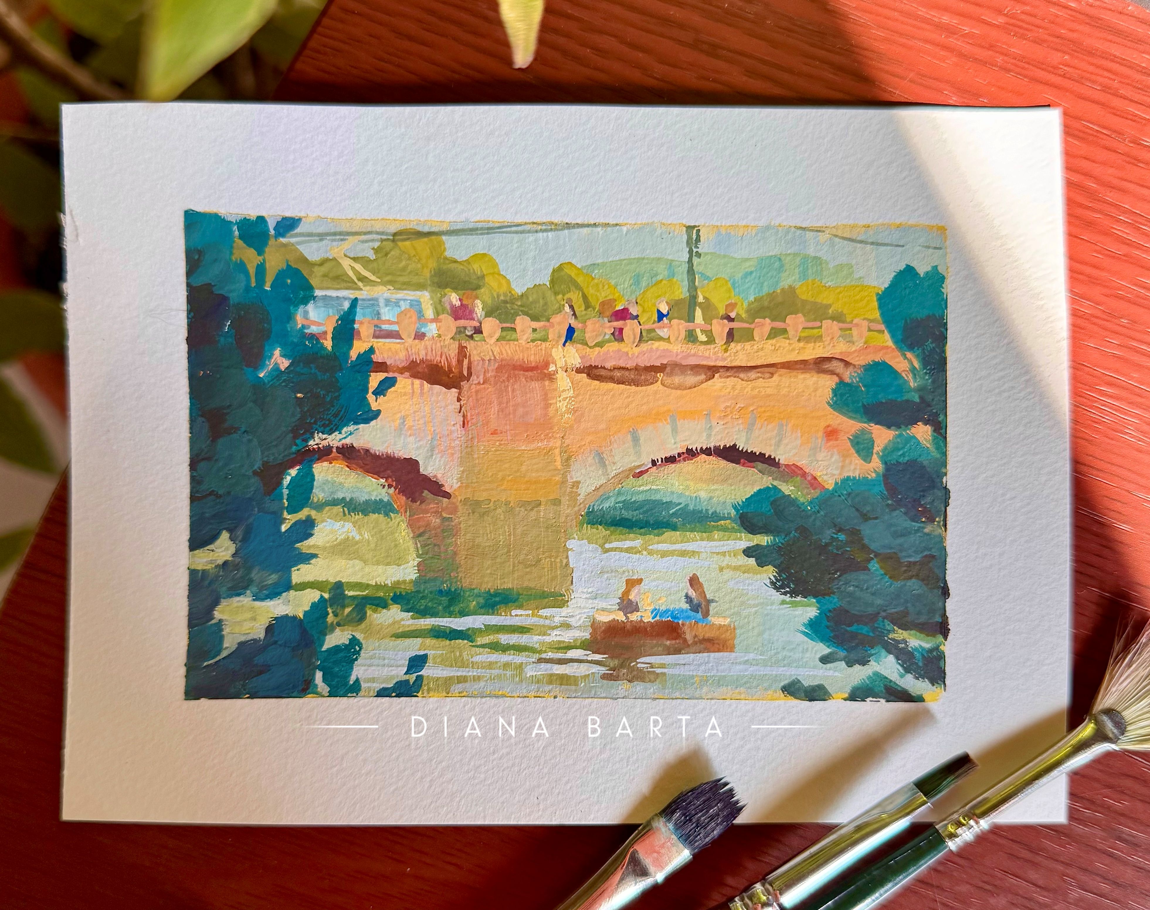 Gouache plein air painting of a bustling bridge in Prague